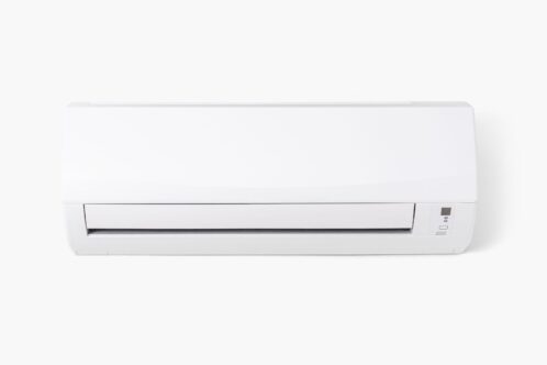 Air conditioner mounted on a white wall